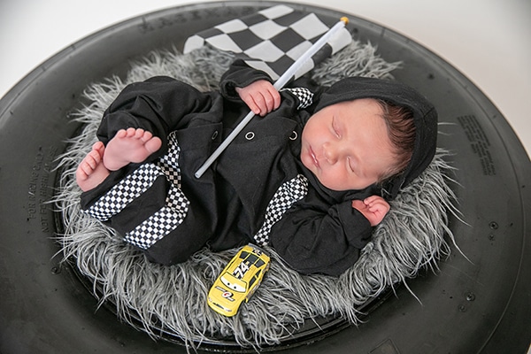 cute-newborn-photo-shoot-theme-racing-car_02x